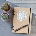 Circular pattern in form of mandala with flower
